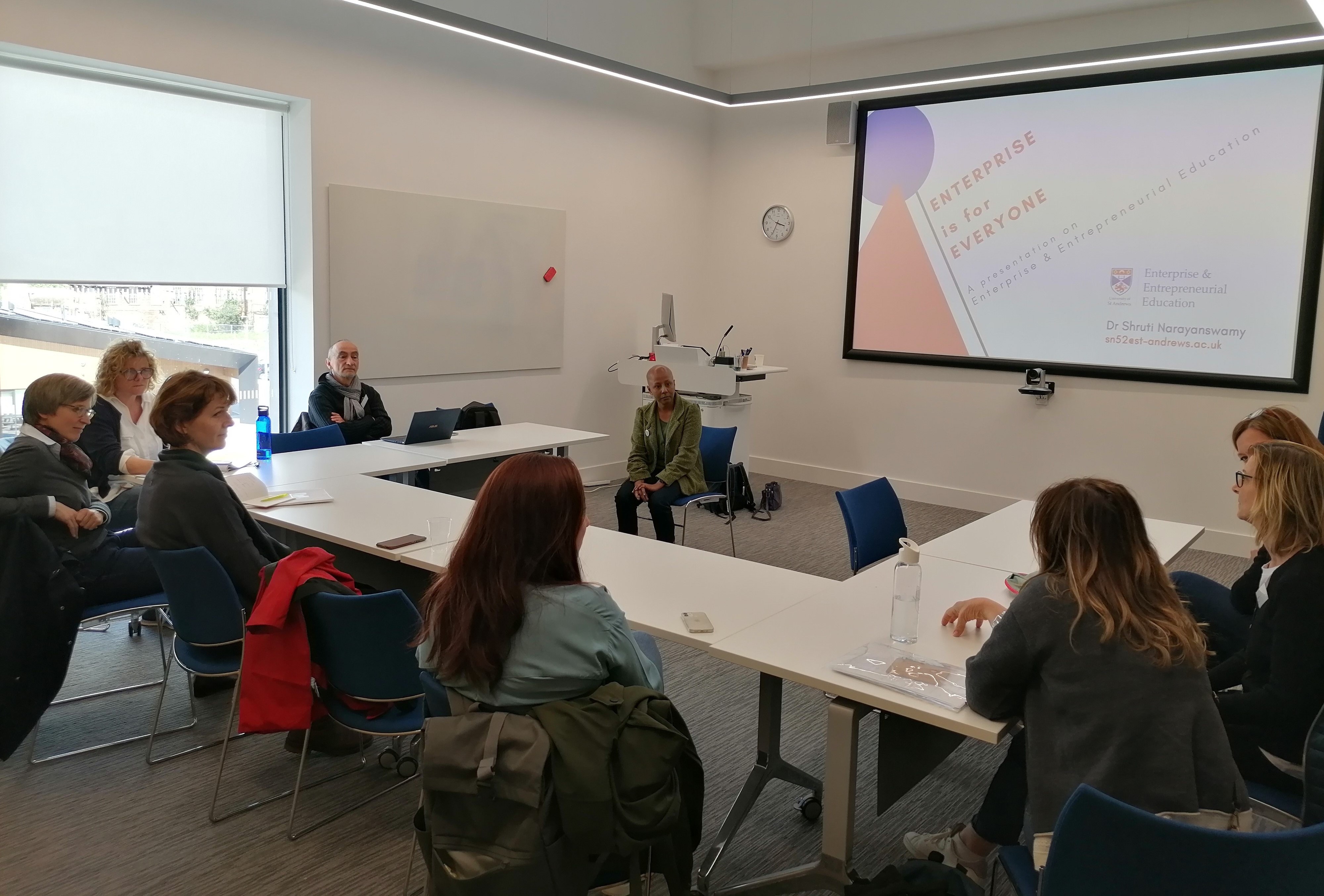 Group of staff in discussion